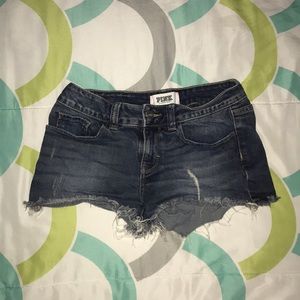 lightly ripped dark wash jean shorts